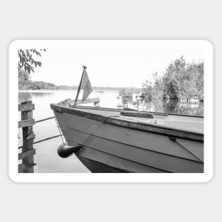 Front end of small motorboat moored on the Norfolk Broads Sticker